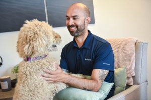 Patient in Animal Assisted Therapy Session | Evergreen Wellness | Integrated Mental & Physical Wellness Centre | Olds and Didsbury Alberta