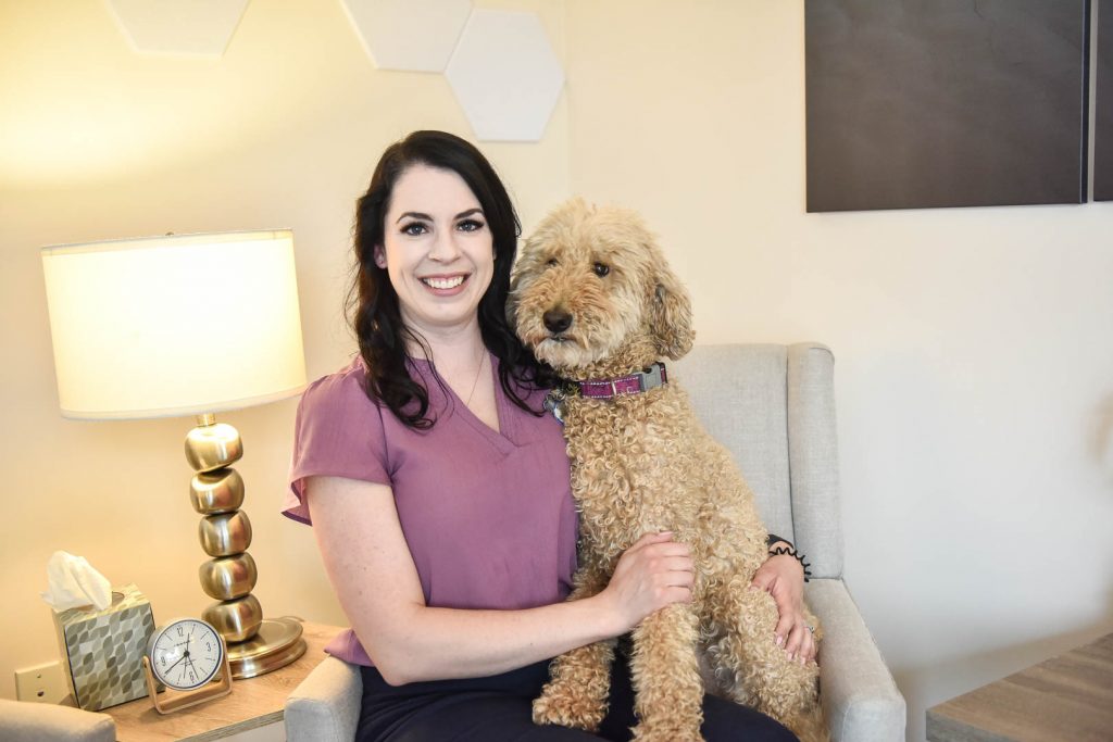 Megan Logan with Therapy Dog | Evergreen Wellness | Integrated Mental & Physical Wellness Centre | Olds and Didsbury Alberta